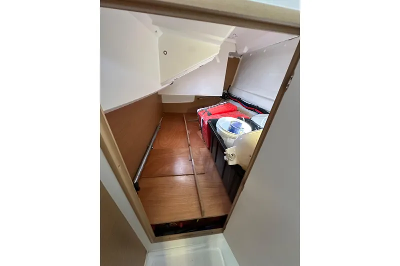 Slide: The Image of Interior storage space of 2021 Jeanneau Sun Odyssey 349 sailboat, featuring organized compartments. - 60
