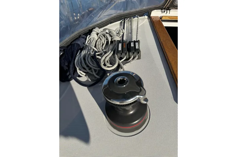 Slide: The Image of Winch and ropes on Jeanneau Sun Odyssey 349 sailboat deck, 2021 model. - 9