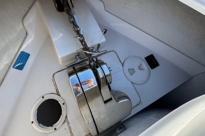 Slide: The Image of Anchor chain mechanism on 2014 Sportsman Heritage 231 Center Console boat. - 14