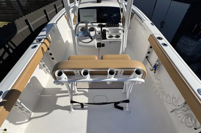 Slide: The Image of 2014 Sportsman Heritage 231 Center Console boat interior with Garmin navigation system. - 36