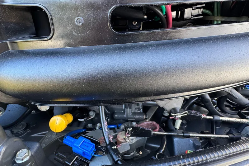 Slide: The Image of Close-up of 2014 Sportsman Heritage 231 Center Console engine components. - 41