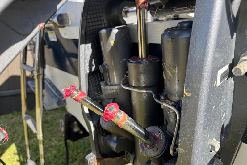 Slide: The Image of Close-up of 2014 Sportsman Heritage 231 Center Console engine components with red grease. - 44