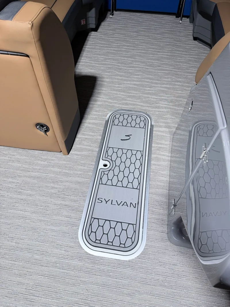 Slide: The Image of Interior of a 2026 Sylvan L5 LZ DH with carpet flooring. - 12