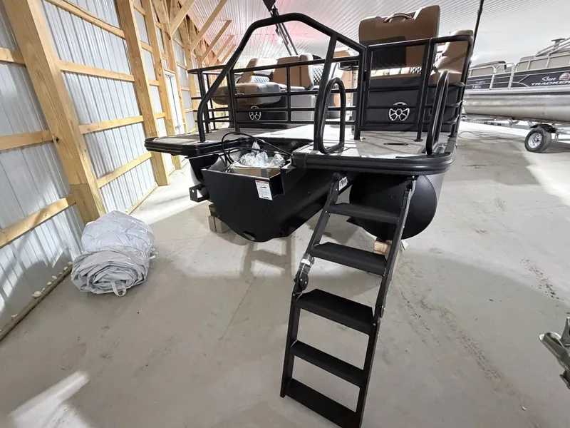 Slide: The Image of 2026 Sylvan L5 LZ DH pontoon boat in warehouse. - 14