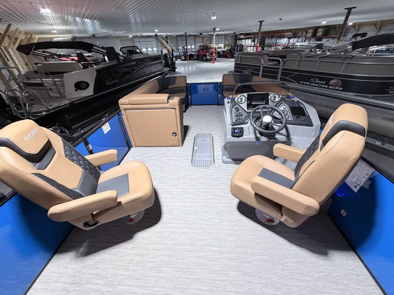 Slide: The Image of Interior of 2026 Sylvan L5 LZ DH with luxurious seating and helm console. - 27