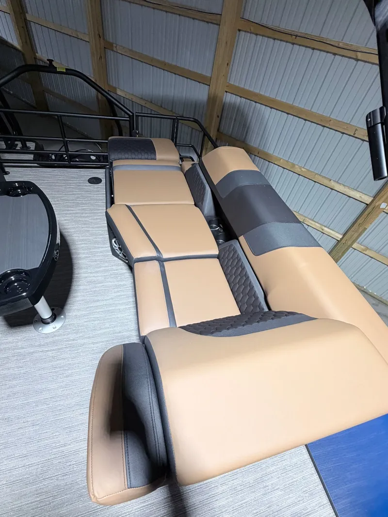 Slide: The Image of Interior of 2026 Sylvan L5 LZ DH pontoon boat with beige seating. - 31