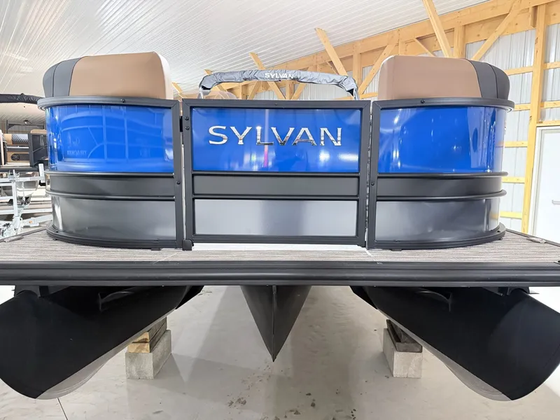 Slide: The Image of 2026 Sylvan L5 LZ DH pontoon boat in a storage facility. - 34
