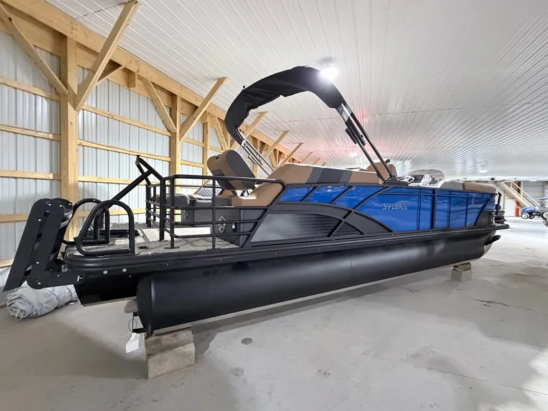 Slide: The Image of 2026 Sylvan L5 LZ DH pontoon boat in storage facility. - 35