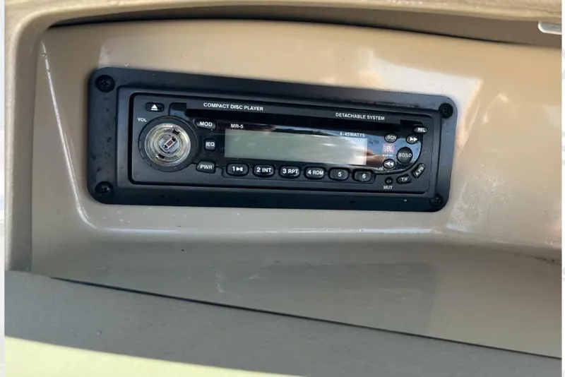 Slide: The Image of 2003 Chaparral 183 SS boat stereo system, compact disc player, dashboard view. - 27