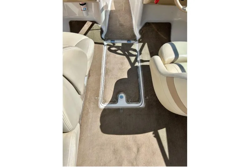 Slide: The Image of Interior of 2003 Chaparral 183 SS boat with beige seating and carpet. - 32