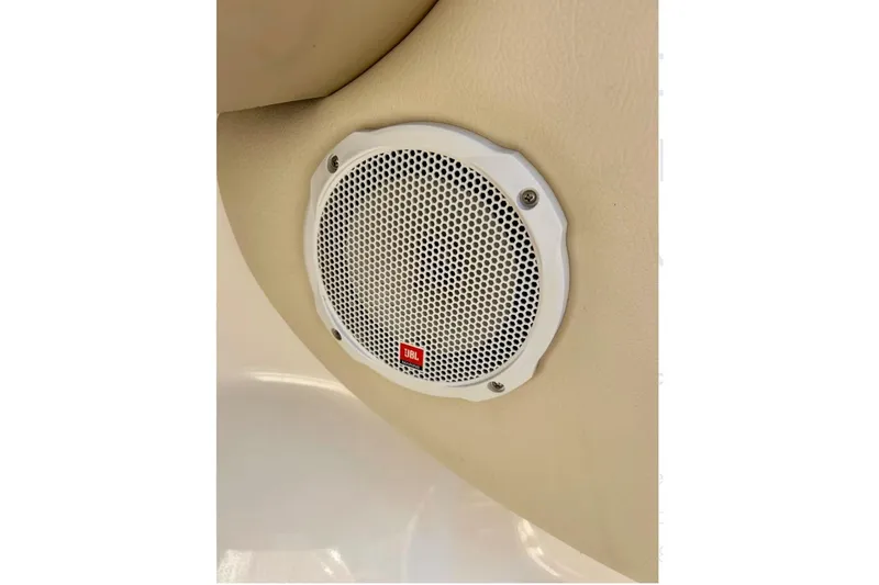 Slide: The Image of White JBL speaker installed in a 2003 Chaparral 183 SS boat interior. - 38
