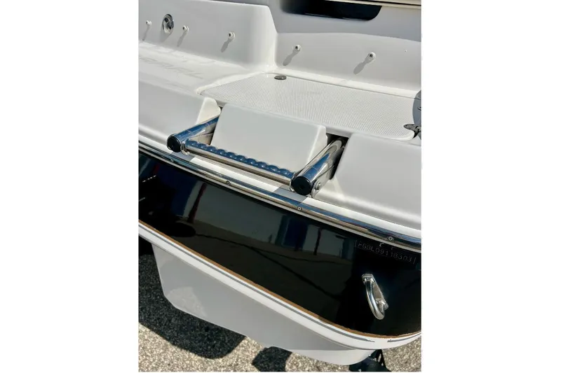Slide: The Image of 2003 Chaparral 183 SS boat with a stainless steel swim ladder. - 39