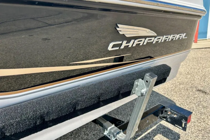 Slide: The Image of 2003 Chaparral 183 SS boat on trailer, close-up of logo and hull design. - 40