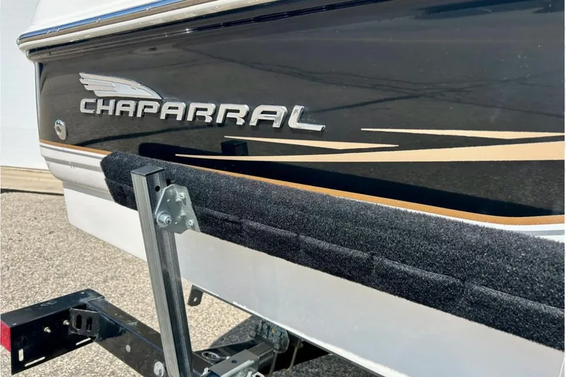 Slide: The Image of 2003 Chaparral 183 SS boat on trailer, close-up of logo and hull design. - 5