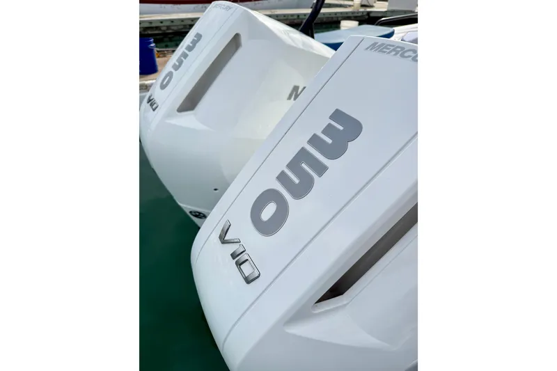 Slide: The Image of Twin Mercury V10 outboard engines on a 2025 Axopar 37 XC Cross Cabin boat. - 50