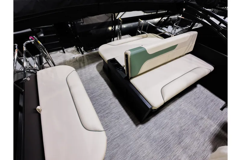 Slide: The Image of 2026 Godfrey Sweetwater 22' Tritoon interior with elegant seating and modern design. - 12