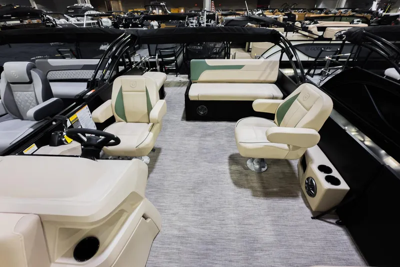 Slide: The Image of 2026 Godfrey Sweetwater 22' Tritoon interior with luxurious seating and modern design. - 8