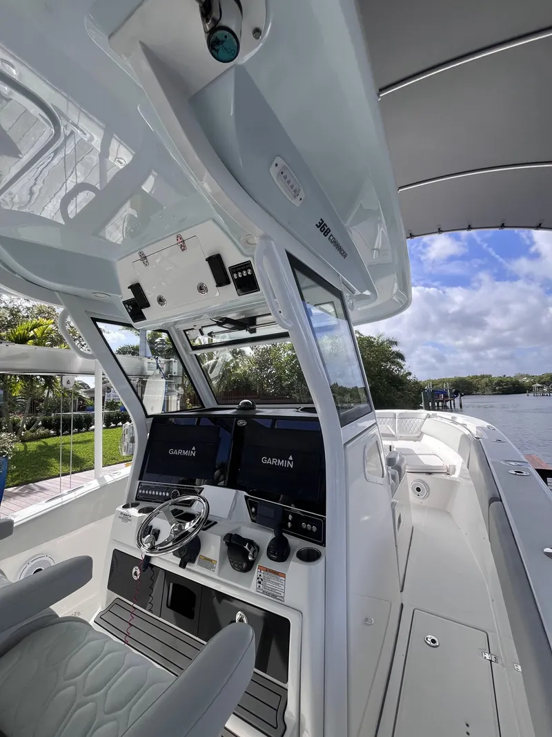 Slide: The Image of 2021 Sea Fox 368 Commander boat interior with advanced navigation systems and sleek design. - 14