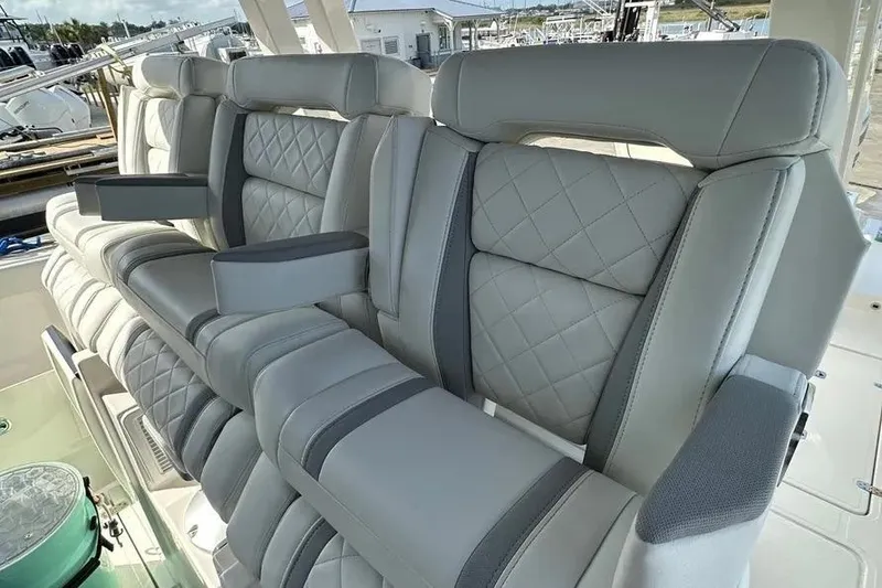 Slide: The Image of 2024 Pursuit S 358 Sport boat with luxurious, quilted leather seating. - 14