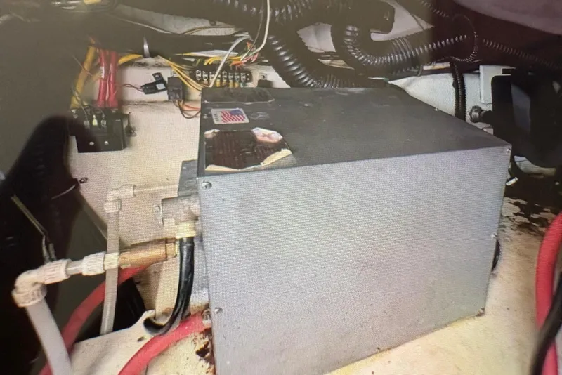 Slide: The Image of 2009 Chaparral Signature 350 engine compartment with wiring and components. - 9