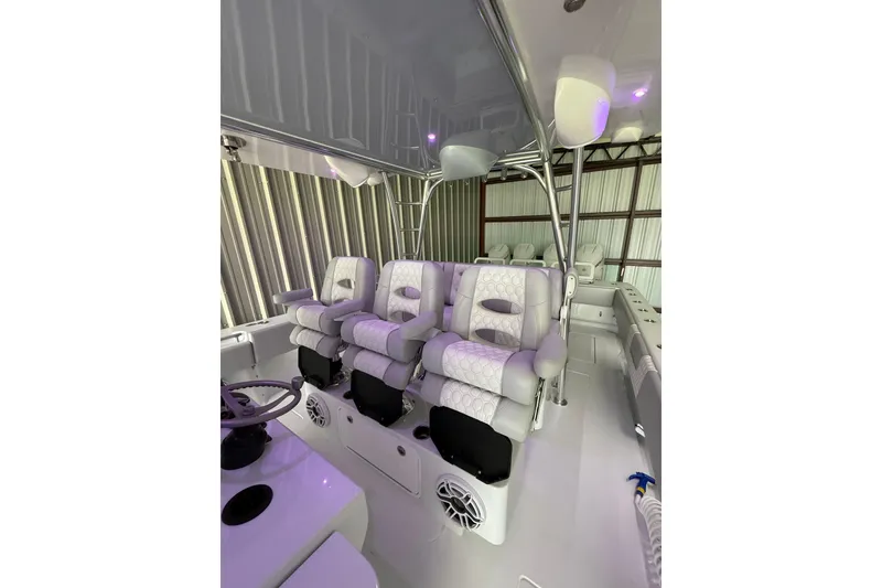 Slide: The Image of Luxurious interior of 2025 Contender 44 ST boat with plush seating and modern design. - 7