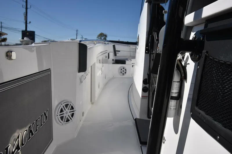Slide: The Image of 2021 Blackfin 332 CC boat interior with sleek design and modern features. - 14