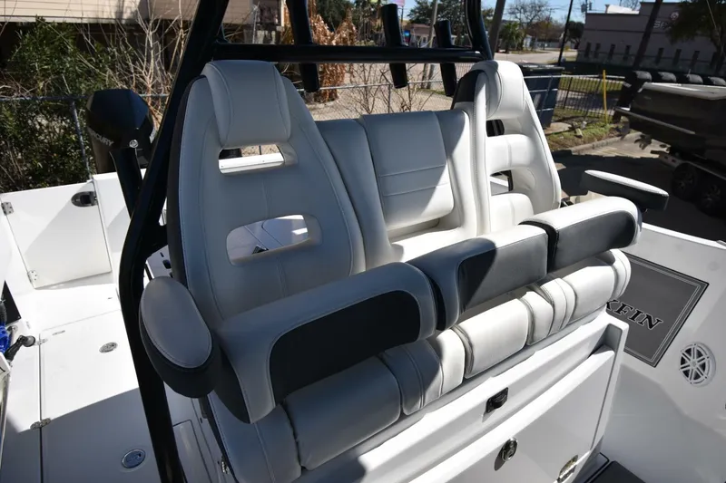 Slide: The Image of 2021 Blackfin 332 CC boat with luxurious white seating and modern design. - 5