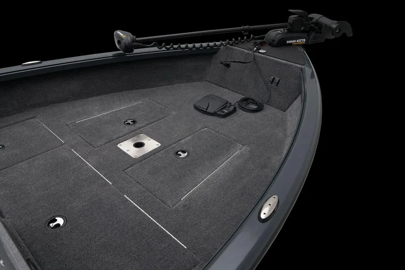 Slide: The Image of 2026 Ranger VS1665SC boat with red exterior and gray carpeted deck. - 8