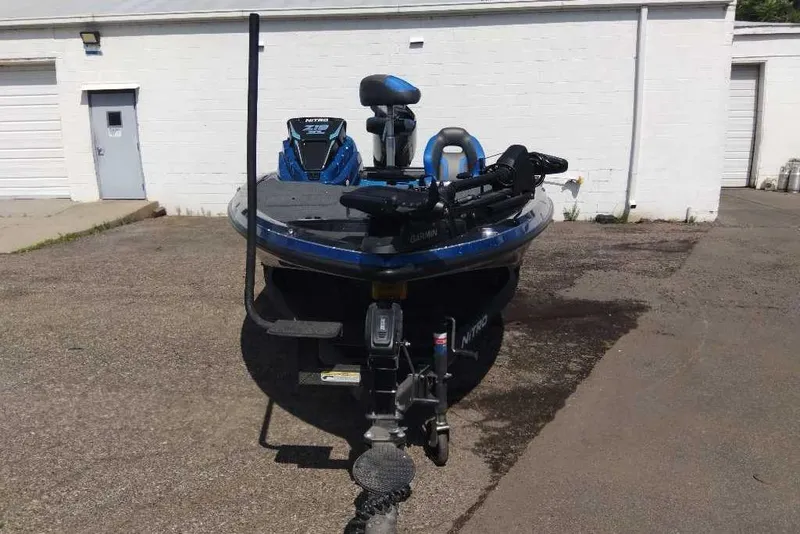 Slide: The Image of 2026 Nitro Z19 XL Pro boat parked outdoors, featuring advanced Garmin equipment. - 3