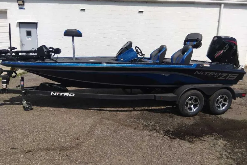 Slide: The Image of 2026 Nitro Z19 XL Pro boat on trailer, parked outdoors. - 1