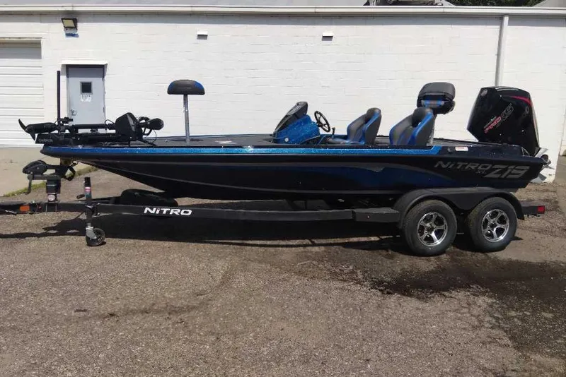 The Image of 2026 Nitro Z19 XL Pro boat on trailer, parked outdoors. - 0