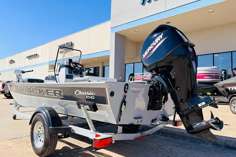 Slide: The Image of 2026 Tracker Bass Tracker Classic CC boat with Mercury engine at dealership. - 7