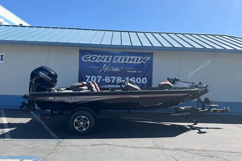 The Image of 2026 Ranger RT178 boat on trailer at Gone Fishin' Marine dealership. - 2
