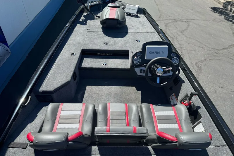 Slide: The Image of 2026 Ranger RT178 boat interior with Garmin navigation system and stylish seating. - 23