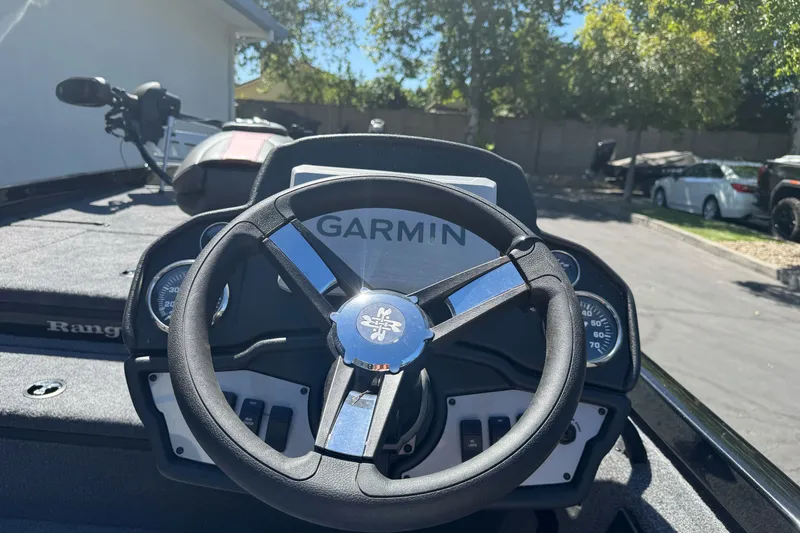 Slide: The Image of Steering wheel of 2026 Ranger RT178 boat with Garmin navigation system. - 12