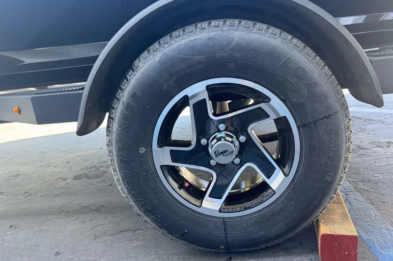 Slide: The Image of 2026 Ranger RT178 wheel with Load Star tire on concrete surface. - 5