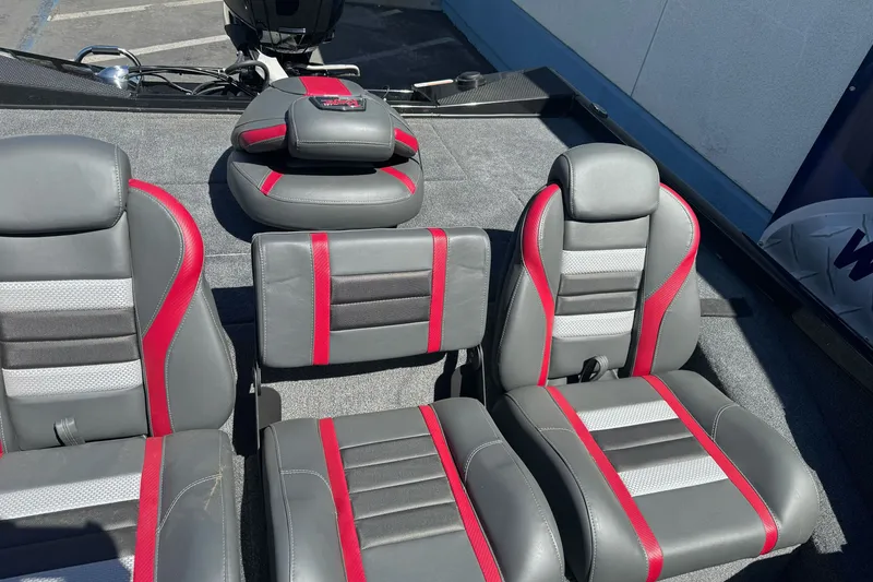 Slide: The Image of 2026 Ranger RT178 boat interior with gray and red seats, showcasing modern design. - 9