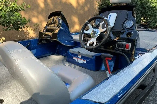 Slide: The Image of Interior of a 2026 Nitro Z17 boat featuring sleek steering and seating. - 4