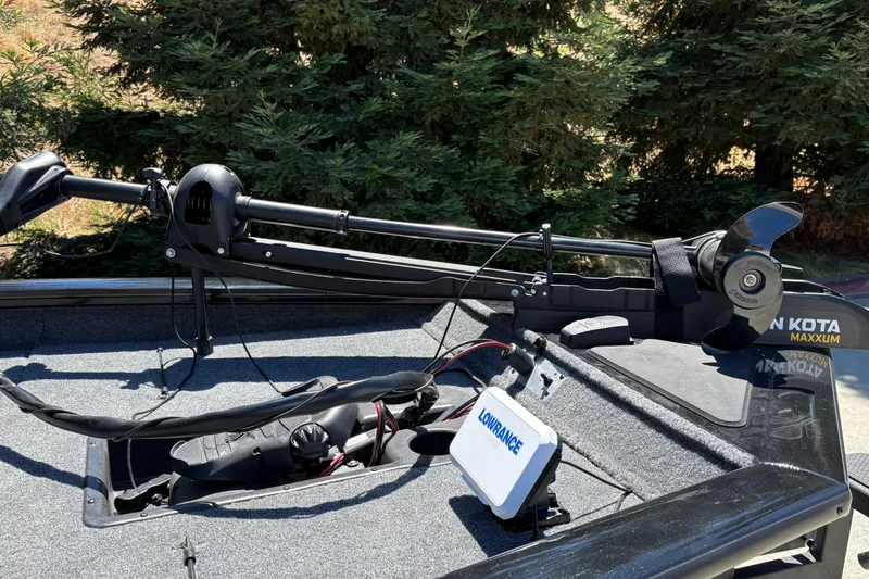 Slide: The Image of 2026 Tracker Pro Guide V-16 SC boat with Minn Kota Maxxum trolling motor and Lowrance electronics. - 21