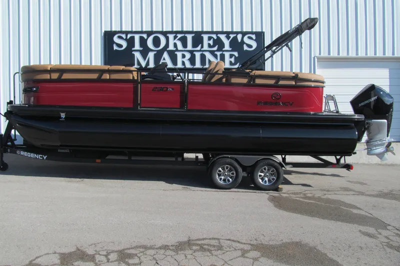 The Image of 2026 Regency 230 DL pontoon boat on trailer at Stokley's Marine. - 1