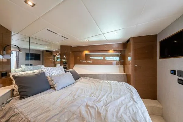 Slide: The Image of Luxurious bedroom interior of 2018 Cruisers Yachts 50 Cantius with modern design and cozy bedding. - 25