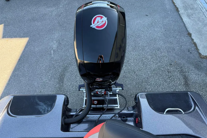 Slide: The Image of 2022 Caymas CX 18 SS boat with powerful outboard motor on display. - 11