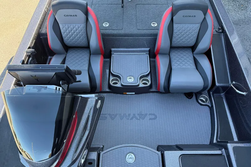 Slide: The Image of 2022 Caymas CX 18 SS boat interior with dual seats and console. - 6