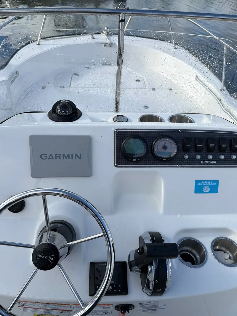 Slide: The Image of Boston Whaler 190 Montauk 2025 helm with Garmin system. - 5