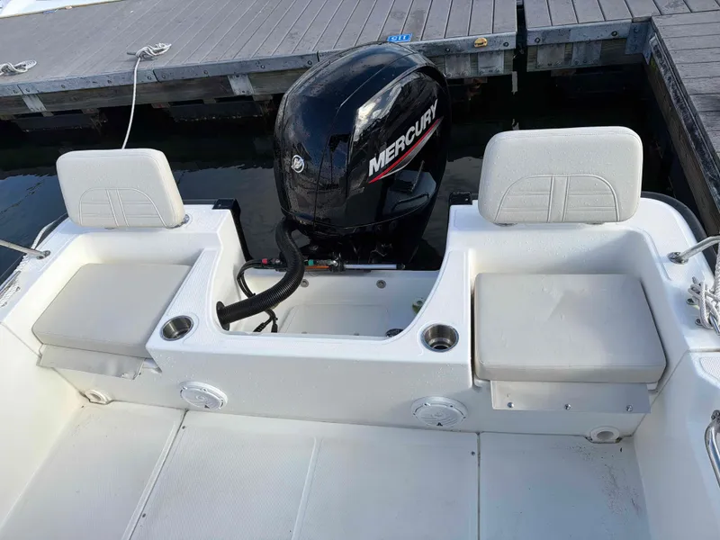 Slide: The Image of Boston Whaler 190 Montauk 2025 with Mercury engine at dock. - 9