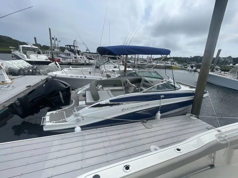 The Image of 2022 Crownline Eclipse E235 XS boat docked at marina. - 0