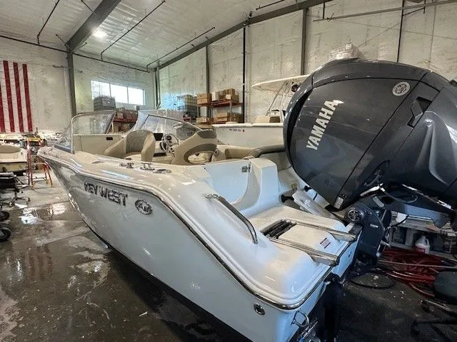 Slide: The Image of Key West 203 DFS boat 2025 in warehouse with Yamaha engine. - 3