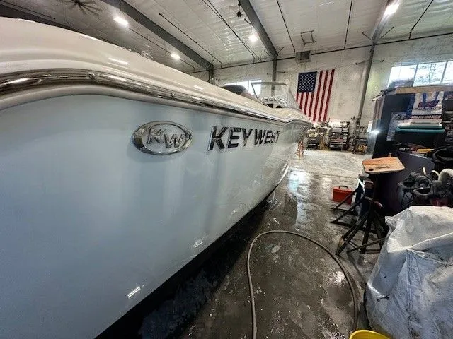 Slide: The Image of Key West 203 DFS boat in workshop, year 2025. - 4