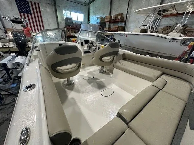 Slide: The Image of Interior view of a 2025 Key West 203 DFS boat in a workshop. - 6