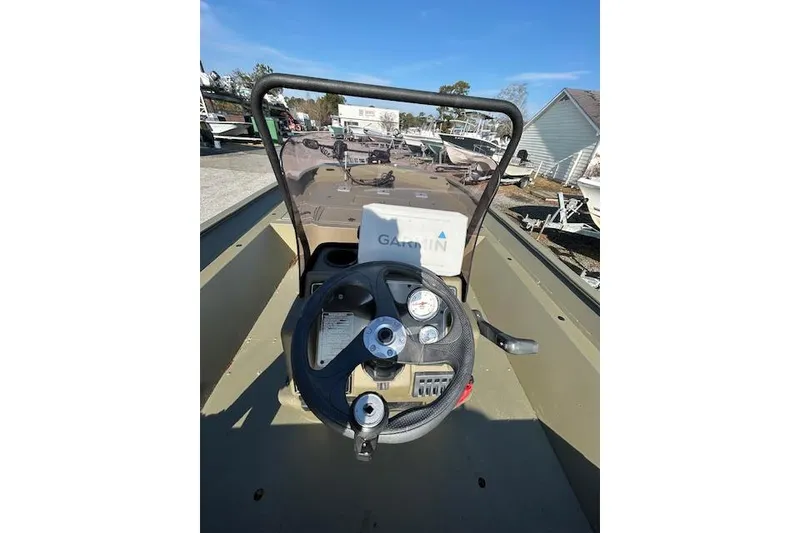 Slide: The Image of 2021 Tracker Grizzly 2072 CC boat console with Garmin navigation system. - 8